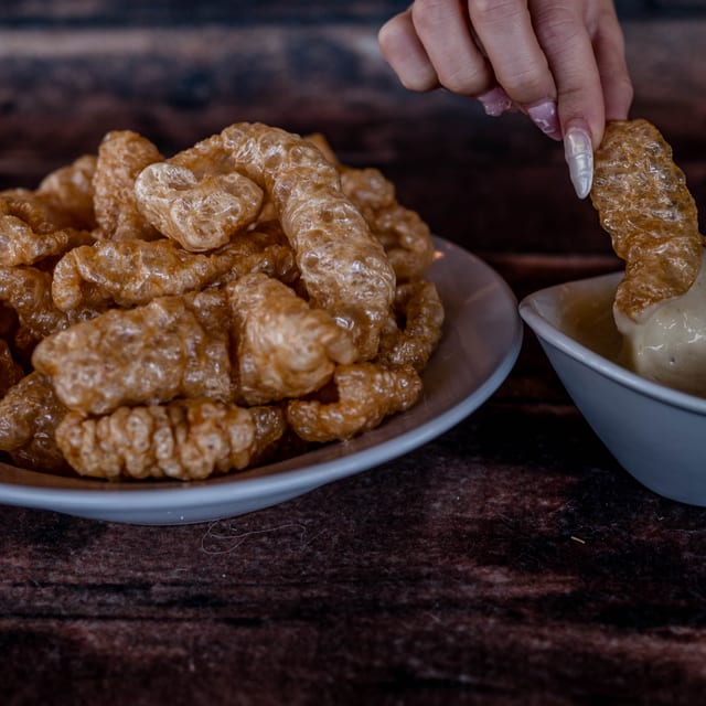 Chicharrones with Tomatillo Salsa and White Queso.